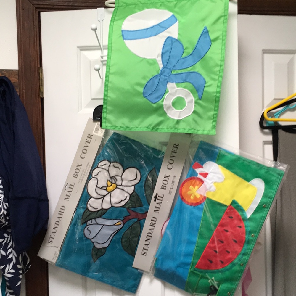 3 new decorative flags: 2 new mailbox covers,1 baby shower flag. Brass grommets.